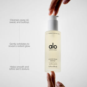 Alo label and pump close-up highlighting ingredients and clean formula