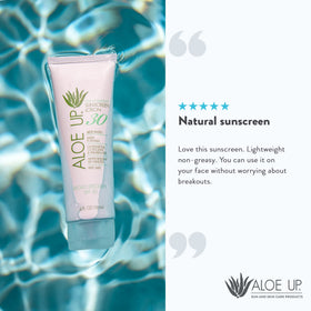 Aloe Up spray next to sunglasses suggesting daily sun-ready convenience