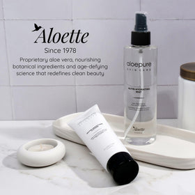 Aloette bottle beside sunscreen demonstrating travel and size convenience