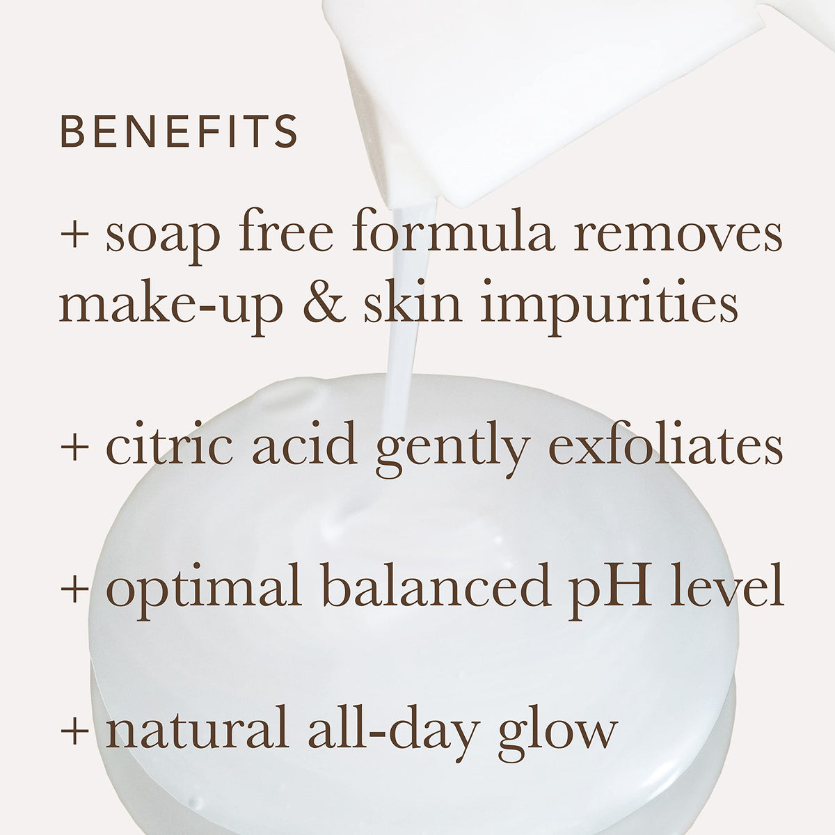Alpha face wash bottle staged with other Alpha products for routine