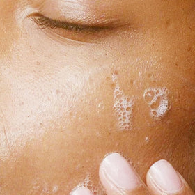 Alpha foam on hand demonstrating effective makeup removal