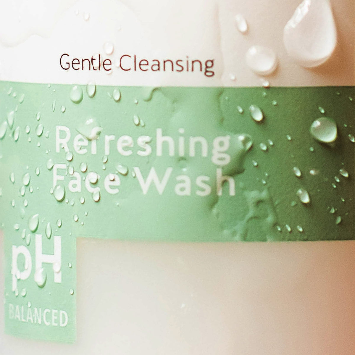 Alpha face wash label and pump detail highlighting product ingredients