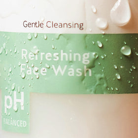 Alpha face wash label and pump detail highlighting product ingredients