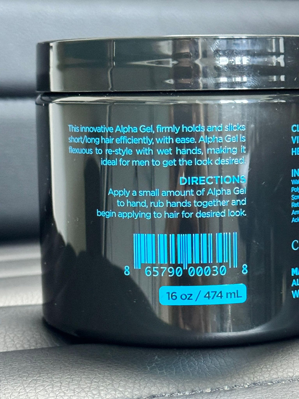 ALPHA gel used in a styled men's haircut showcasing neat hold and natural finish benefit