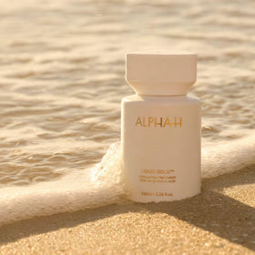Alpha-H used in nighttime routine setting showing relaxing evening skincare ritual