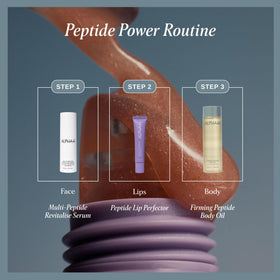 Alpha-H lip perfector in a handbag setting, ideal for on-the-go hydration