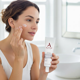 Alpha flatlay of vitamins and tube showing antioxidant blend for skin support