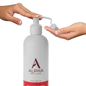 Alpha applying lotion to forearm demonstrating hydration and exfoliation