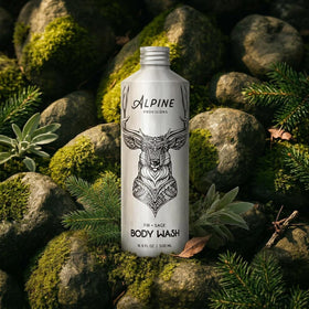 Alpine Provisions label close-up listing fir, sage, aloe vera, and coconut oil benefits