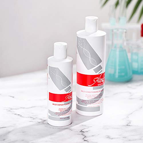 Alra bottle held in hand to show 16oz size and travel-friendly benefit