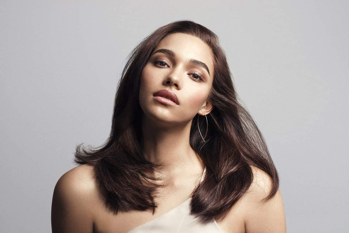 Alterna after-use shiny hair result showing improved shine and smoothness