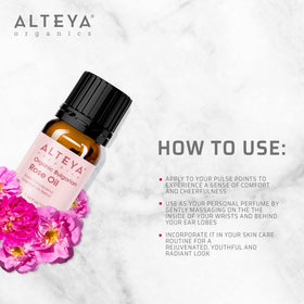 Alteya Organics dropper dispensing rose otto oil for precise application
