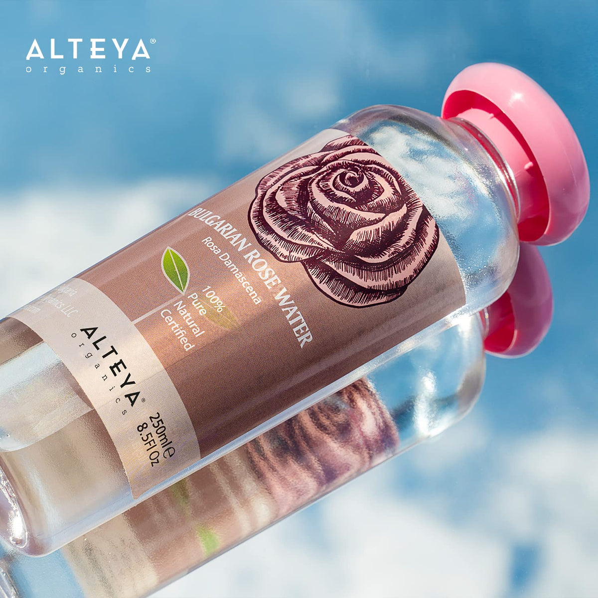 Alteya Organics spray misting into hand for instant hydration benefit