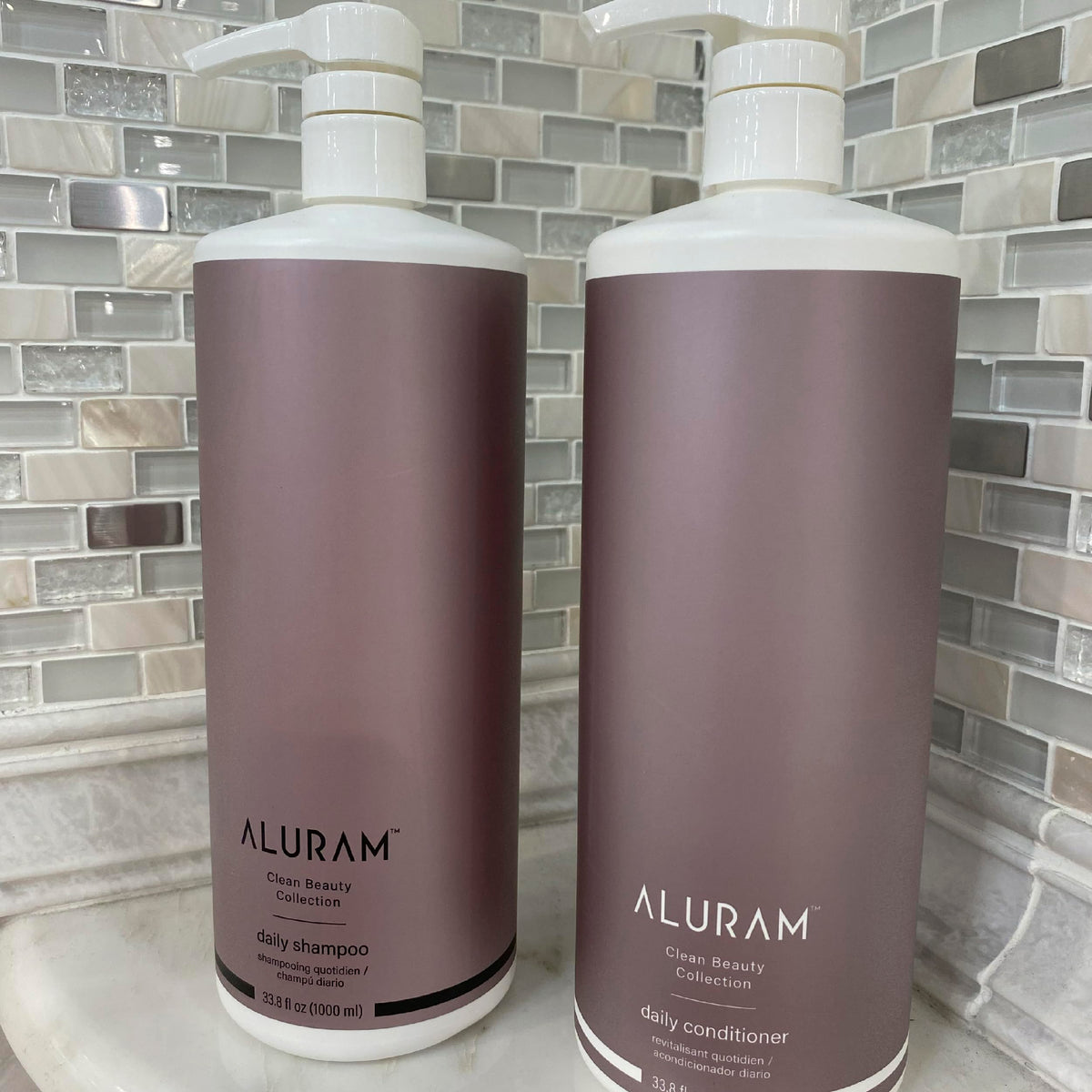 ALURAM back label displaying ingredients and clean-beauty claims