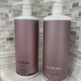 ALURAM back label displaying ingredients and clean-beauty claims