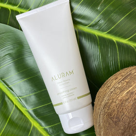 ALURAM cream on hand applied to hair demonstrating easy application and slip