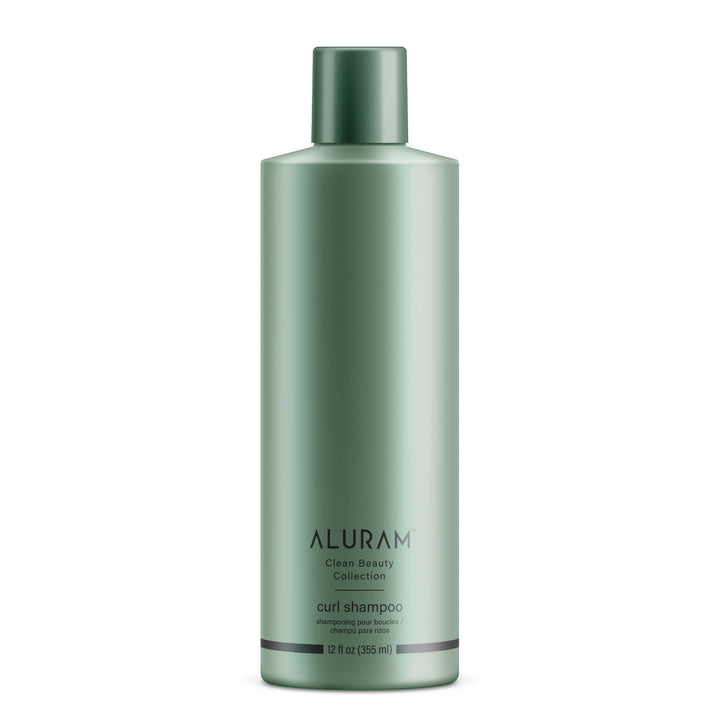 ALURAM front bottle view showing clean packaging and curl-friendly formula