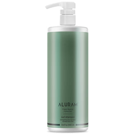 ALURAM front bottle view showing product clarity and curl care benefits