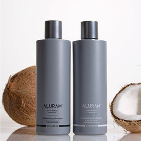 ALURAM pouring conditioner onto wet hair for smoothing and shine