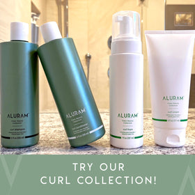 ALURAM curl cream on bathroom shelf indicating daily routine convenience