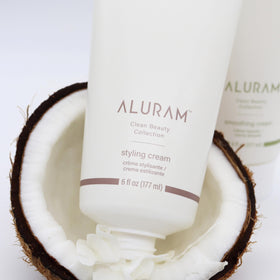 ALURAM hand applying styling cream demonstrating easy workability and control