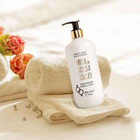 Alyssa Ashley close-up of lotion being dispensed from pump highlighting texture and quick absorption benefit