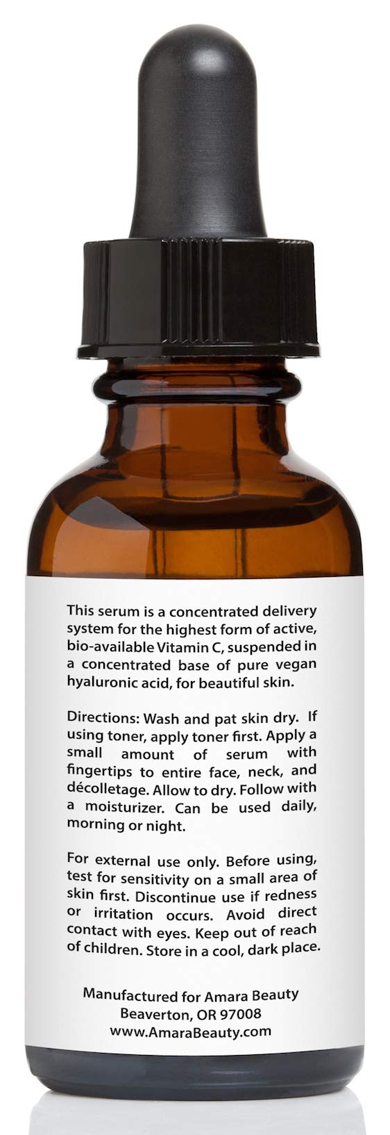 Amara Beauty serum bottle staged with moisturizer and towel to show routine use