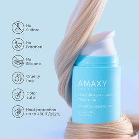 AMAXY bottle next to hairbrush to display 1.69 fl oz size and portable styling convenience