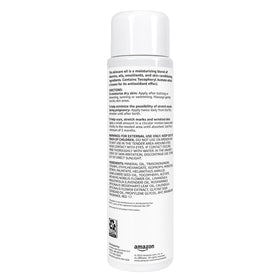 Amazon Basics bottle next to hand for scale showing travel-friendly 6.7 fl oz size benefit