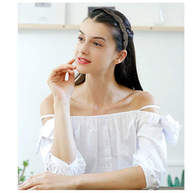 AMCAMI headband worn as bracelet showing dual-use convenience