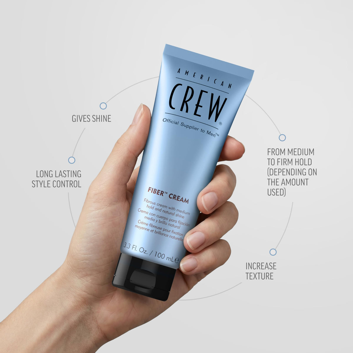 American Crew cream on hands demonstrating smooth application and easy spreadability