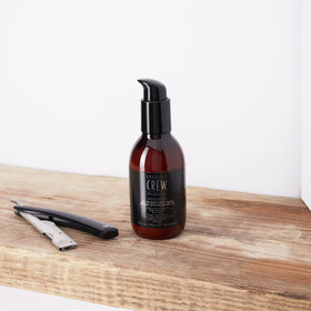 AMERICAN CREW balm applied after shave illustrating reduced redness benefit