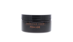 American Crew styled slick-back on model showing high shine professional finish