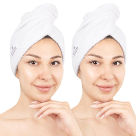 American Soft Linen front view of two white towel wraps showing compact packaging and convenience