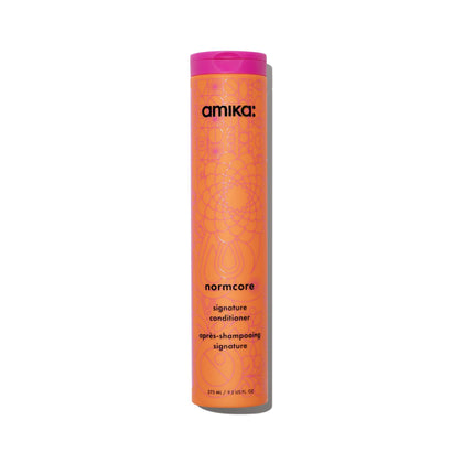 amika bottle front packaging shows signature conditioner with clear branding and everyday appeal