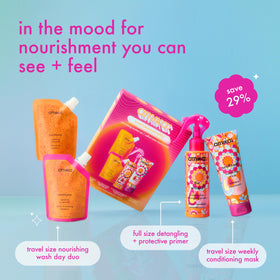 Amika travel-size Normcore shampoo and conditioner showing hygiene and convenience