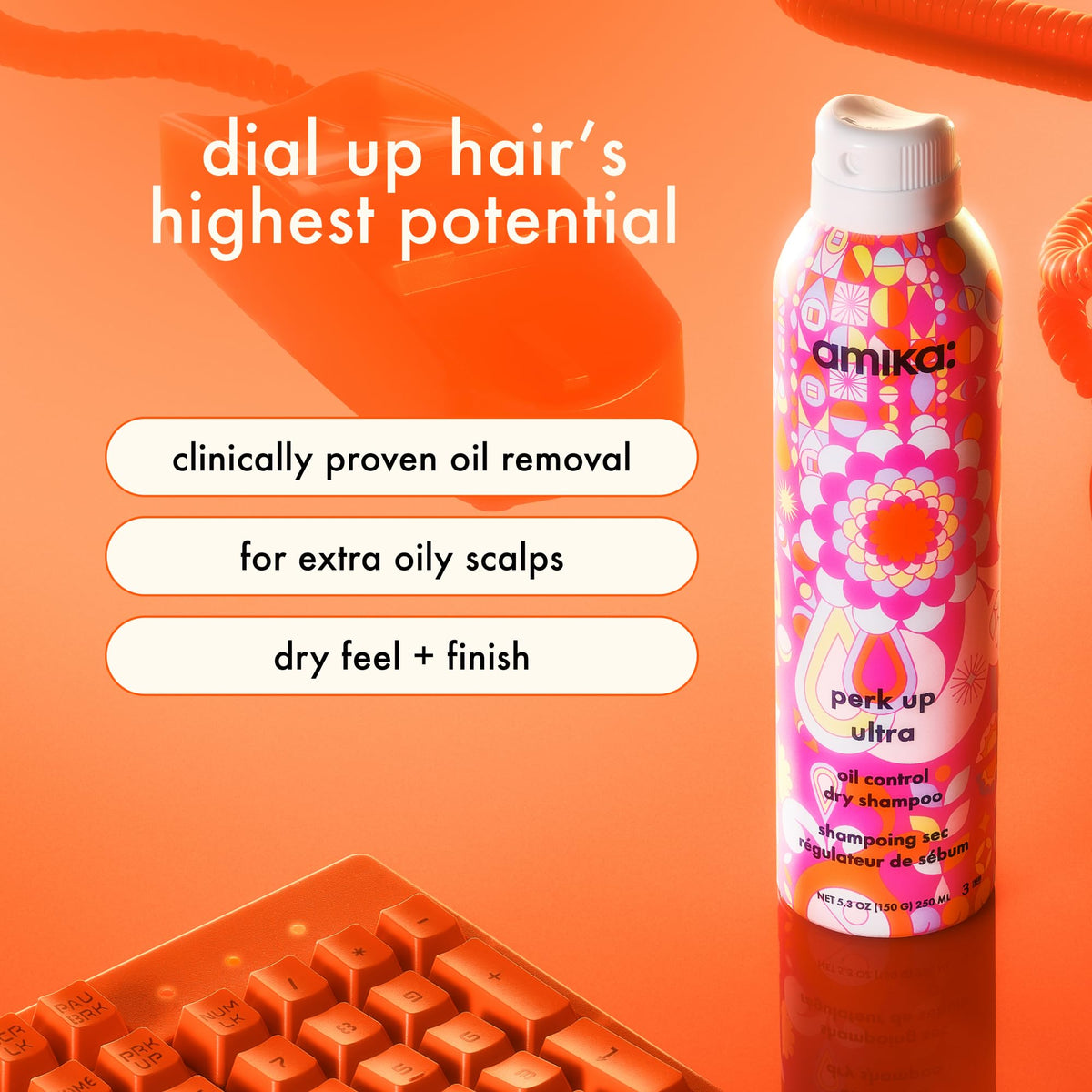Amika Perk Up Ultra aerosol nozzle close-up illustrating precise application control