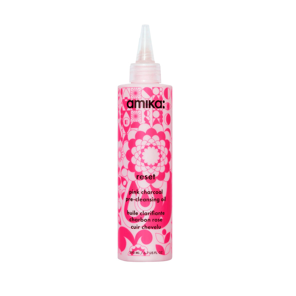 Amika Reset Pink Charcoal front packaging shows bottle and label, clarifying benefit