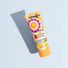 amika open cap showing creamy texture, demonstrates quick-absorbing formula