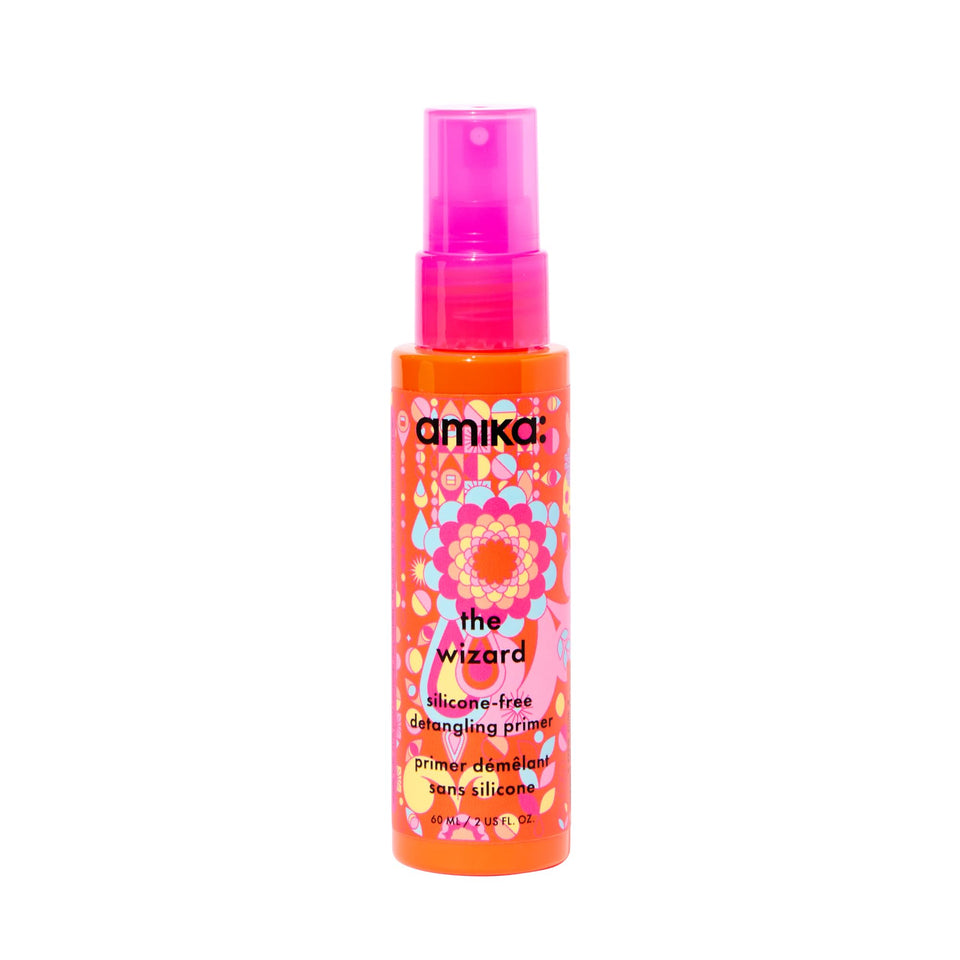 Amika bottle front packaging showing product and benefit of heat protection
