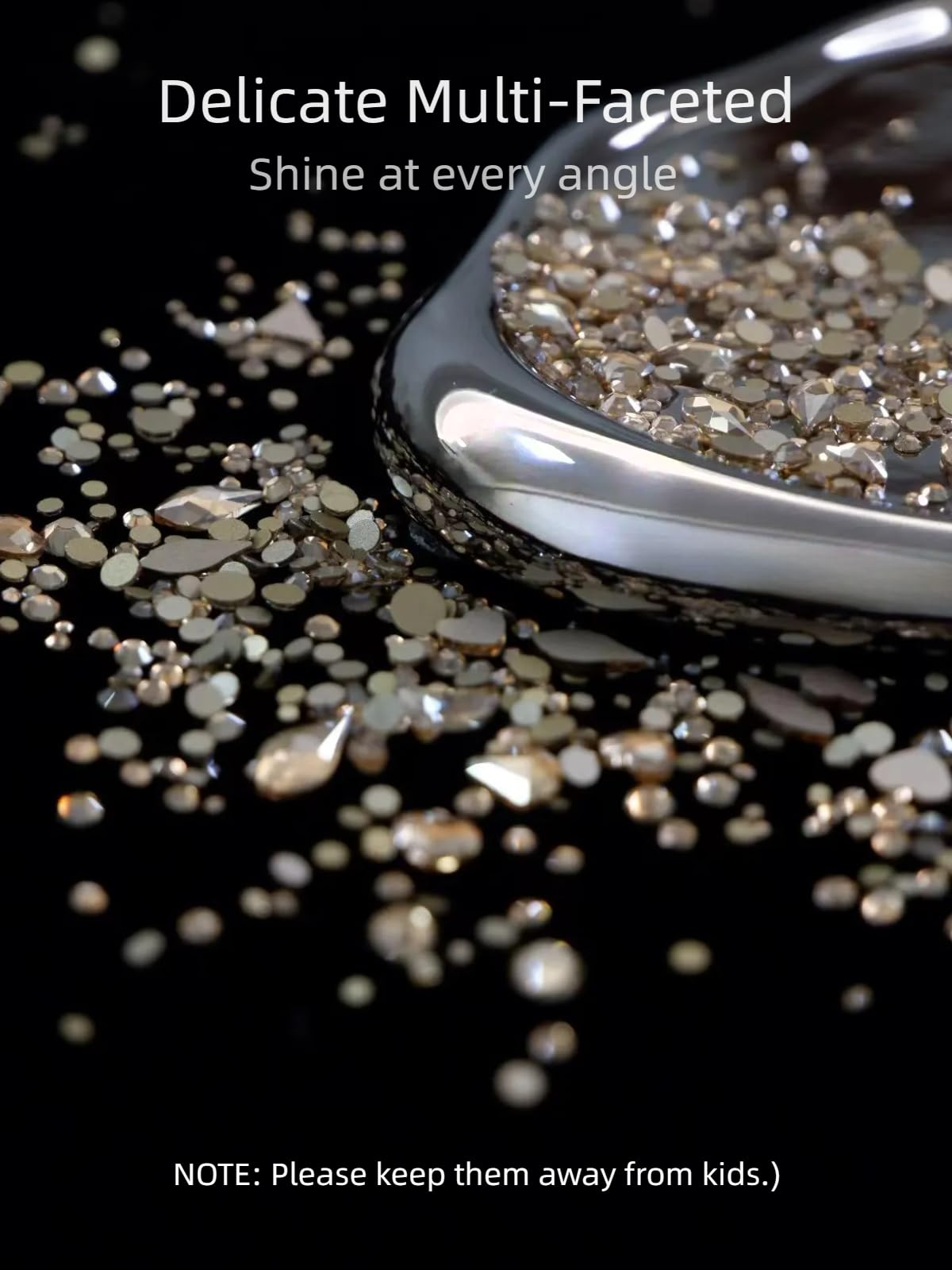 AMLAVIFISH tweezers placing a gold flatback gem demonstrating precise application for professional results
