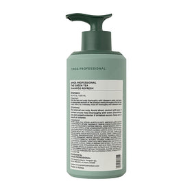 AMOS PROFESSIONAL stylist applying shampoo in salon illustrating professional use