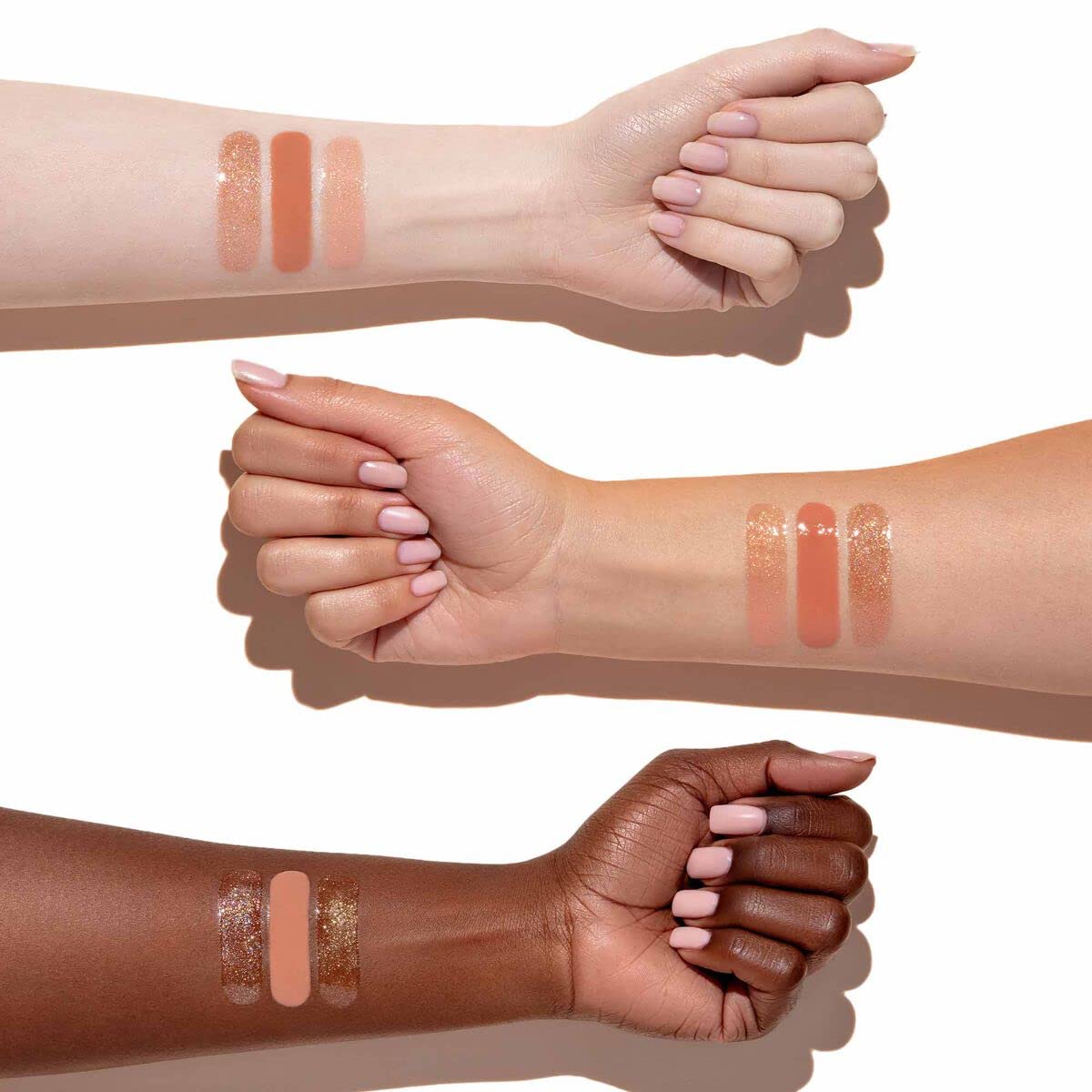 Anastasia Beverly Hills texture swatches on skin showing luminous pigment and reflective finish