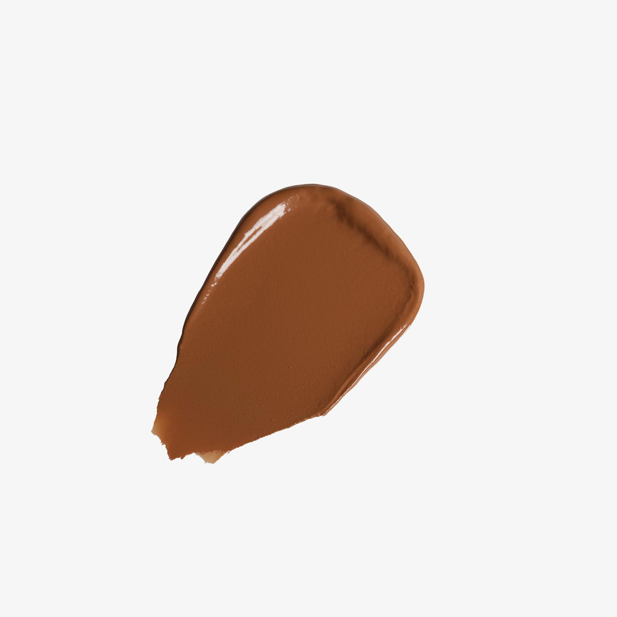 Hand holding Anastasia Beverly Hills balm to show size and portability, travel-friendly benefit
