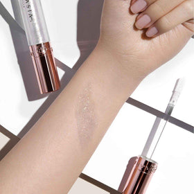 Anastasia Beverly Hills gloss texture close-up showing mirror-like shine and smoothness