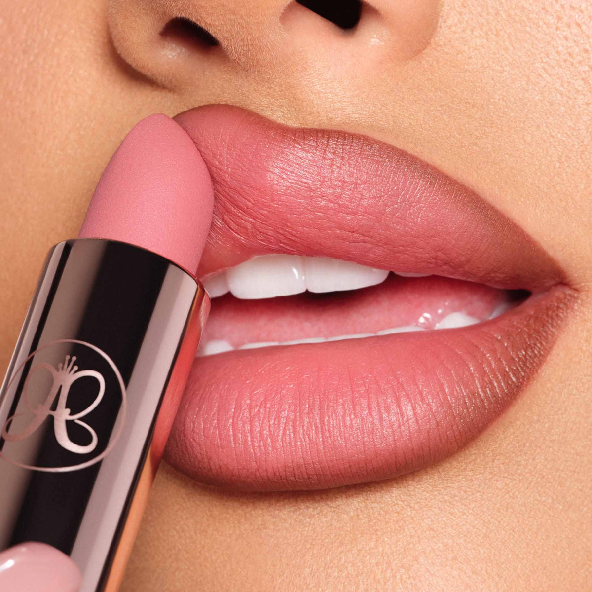 Anastasia Beverly Hills lipstick applied on lips showing comfortable matte finish