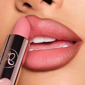 Anastasia Beverly Hills lipstick applied on lips showing comfortable matte finish