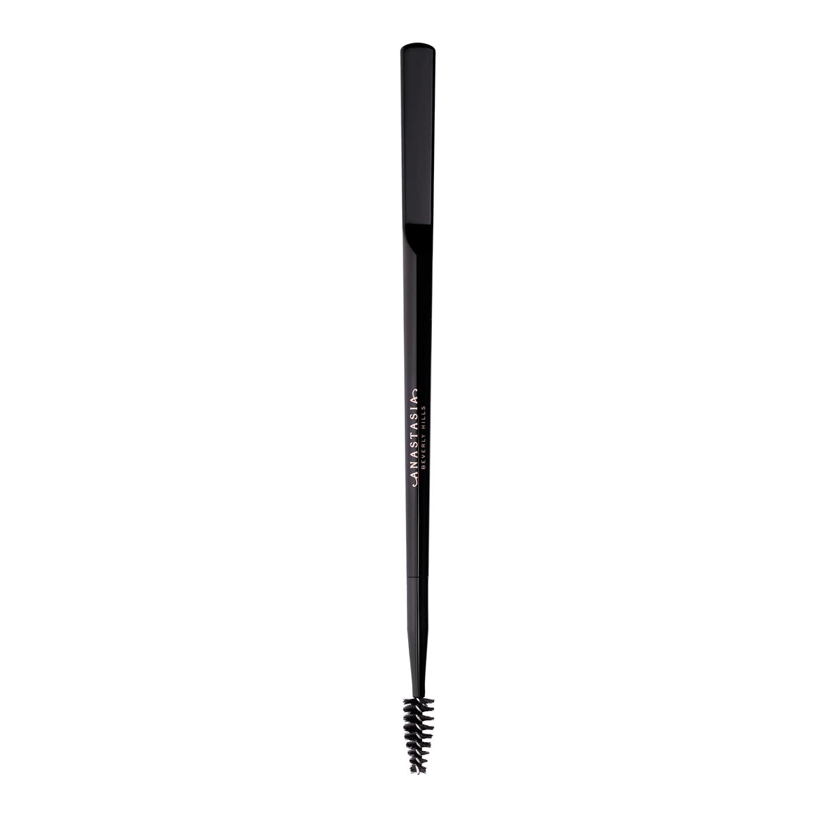 Anastasia Beverly Hills spatula close-up pressing hairs for laminated finish
