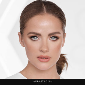 Anastasia Beverly Hills angled brush applying powder for targeted brow definition
