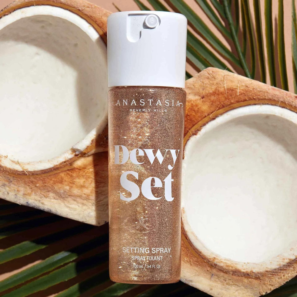 Anastasia Beverly Hills mist closeup demonstrating ultra-fine atomizer for even, lightweight application benefit